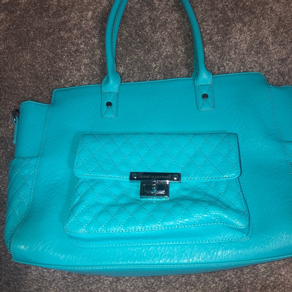 Damsel in defense concealed to carry bag